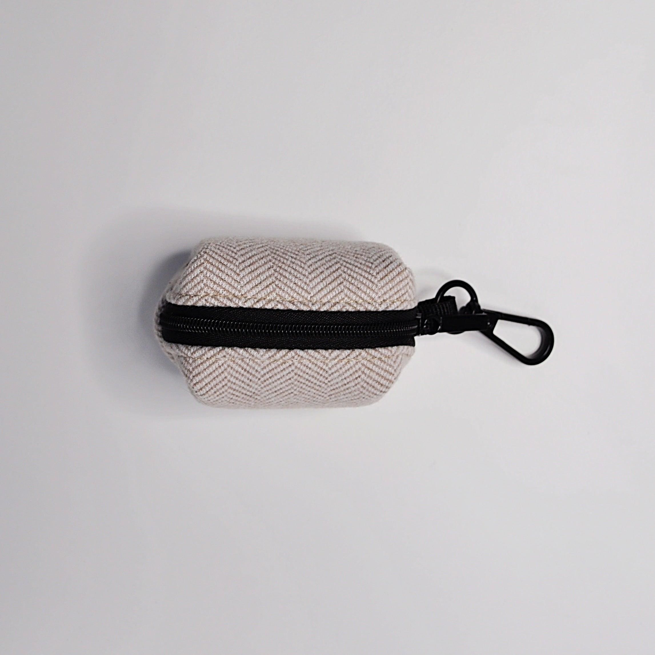 Beige poop bag holder