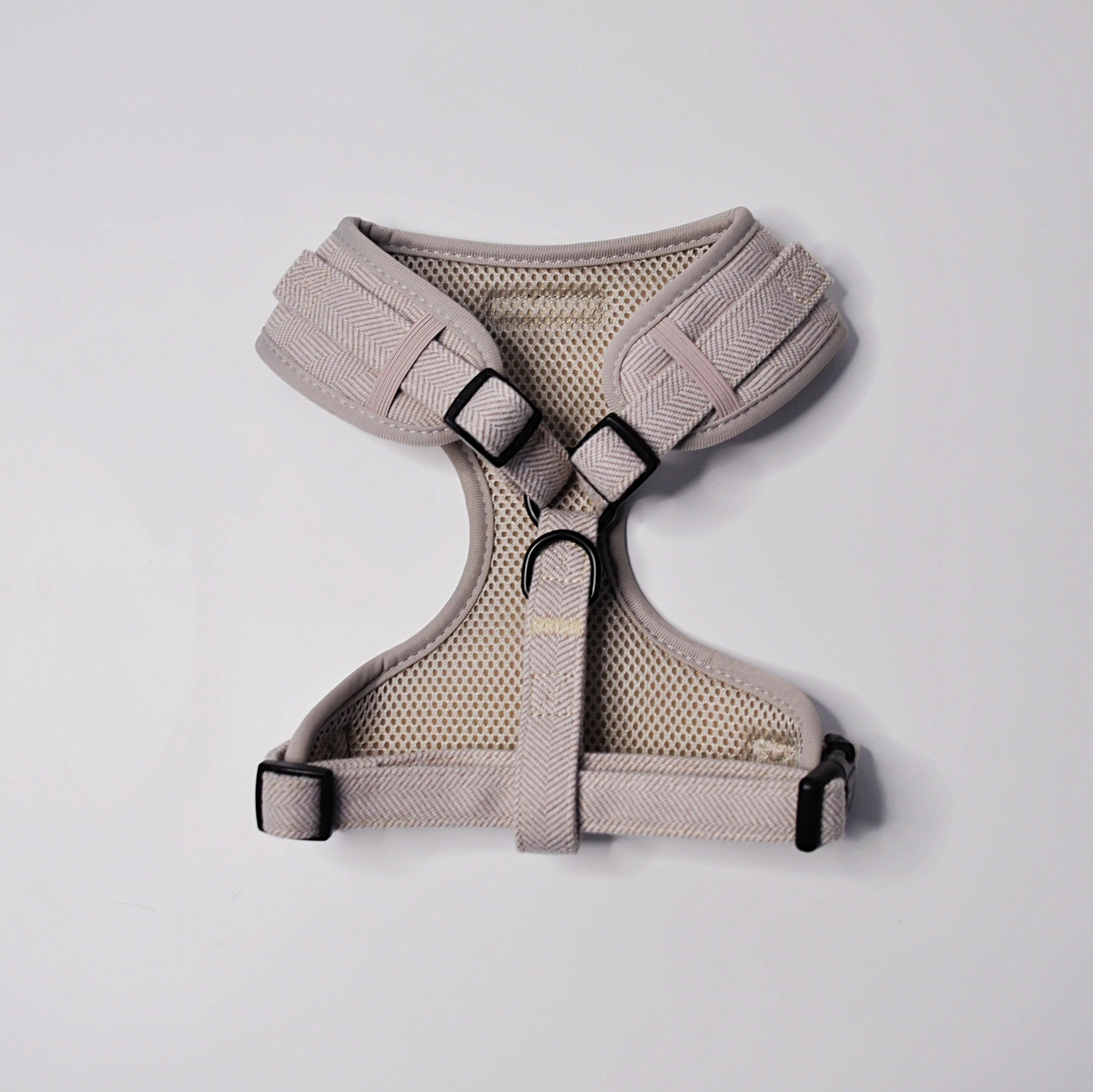 Close-up showing adjustable straps and quick-release buckle on Soft Truffle Tweed Dog Harness
