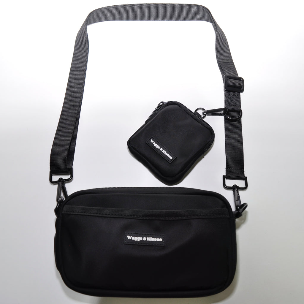 black crossbody dog walking bag with treat pouch