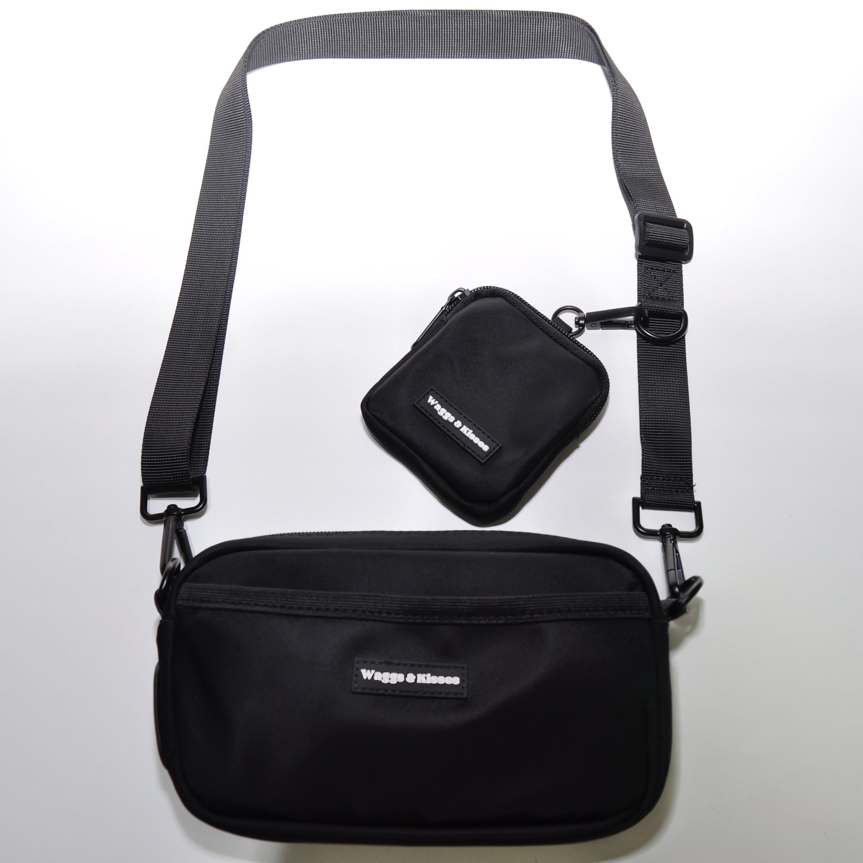 black crossbody dog walking bag with treat pouch